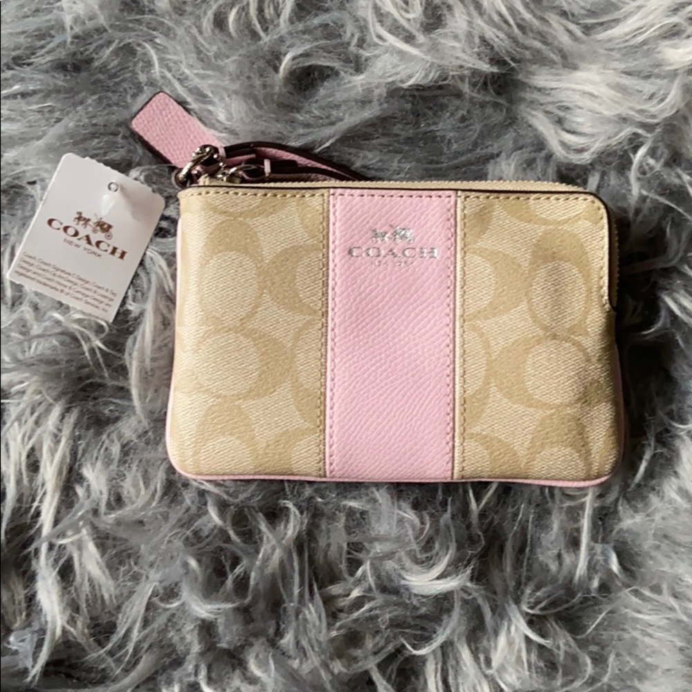 Pink & tan Coach wristlet